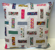  Scrappy quilted cushion